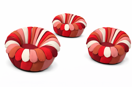  Rosso Bloom lounge chairs in layered red and blush tones arranged in a luxury lounge setting.