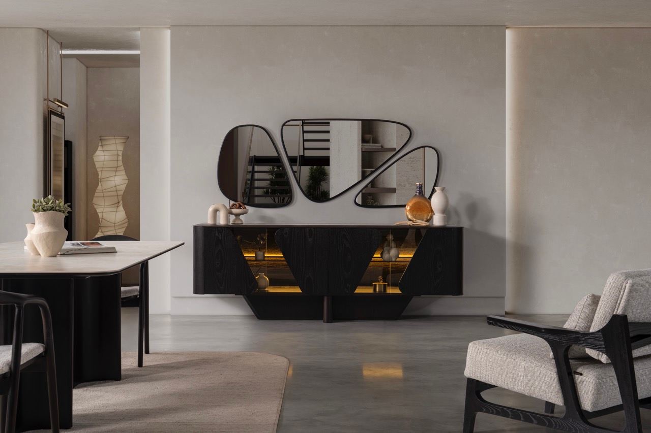 Noirwood luxury furniture collection featuring sculptural dark wood sideboard with ambient lighting and modern abstract mirrors.