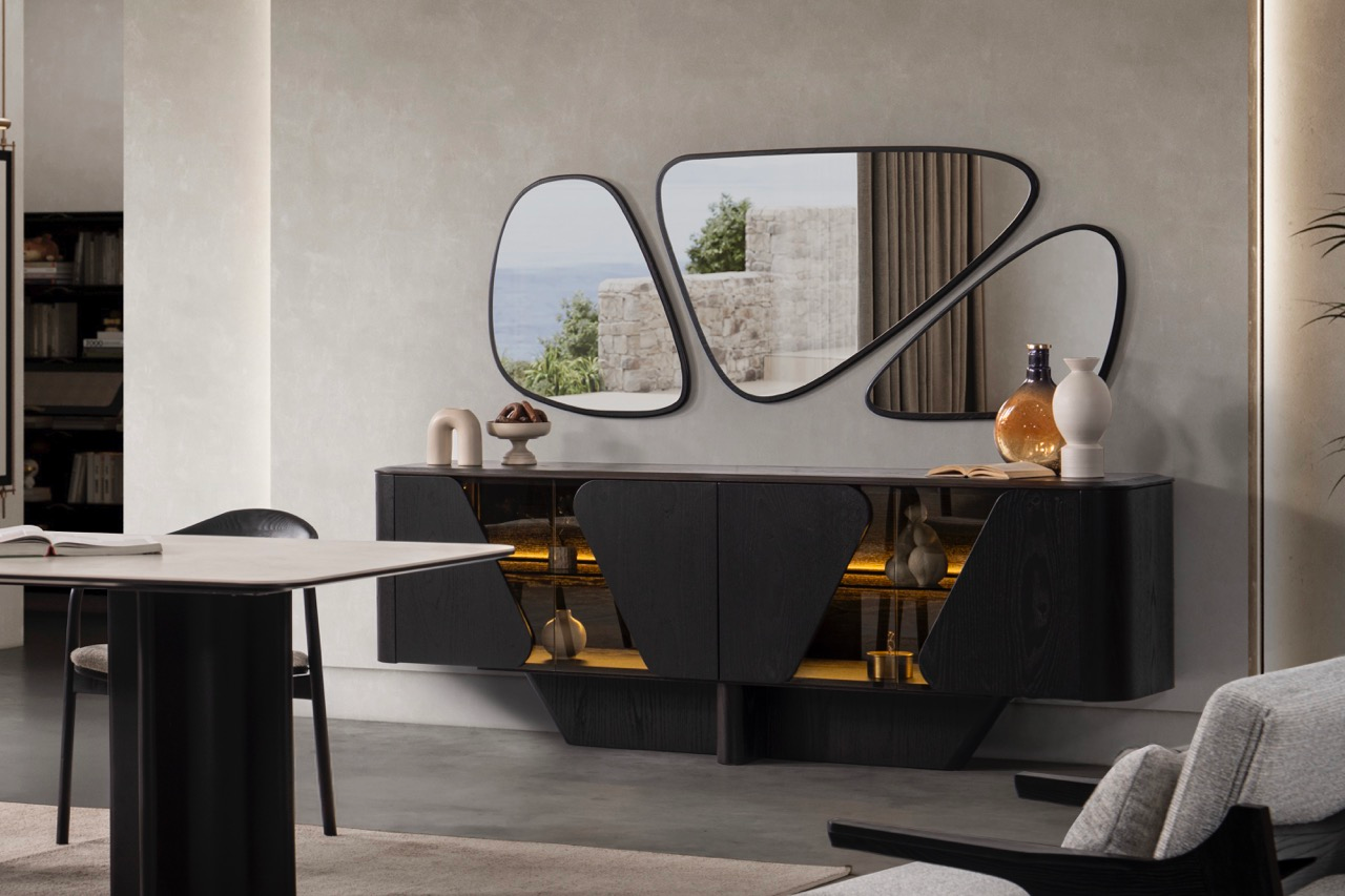 Noirwood luxury furniture collection featuring sculptural dark wood sideboard with ambient lighting and modern abstract mirrors.