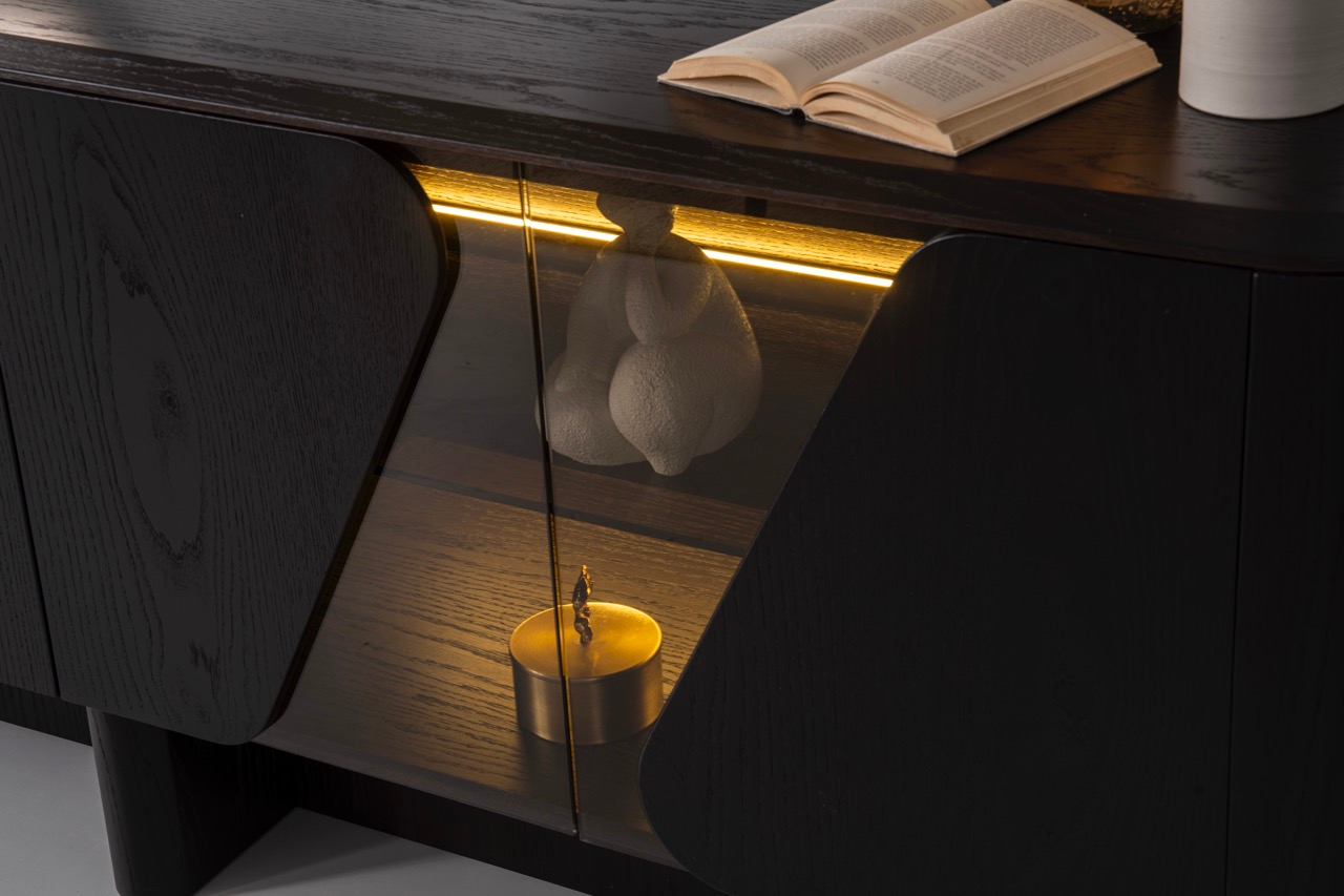 Noirwood luxury furniture collection featuring sculptural dark wood sideboard with ambient lighting and modern abstract mirrors.