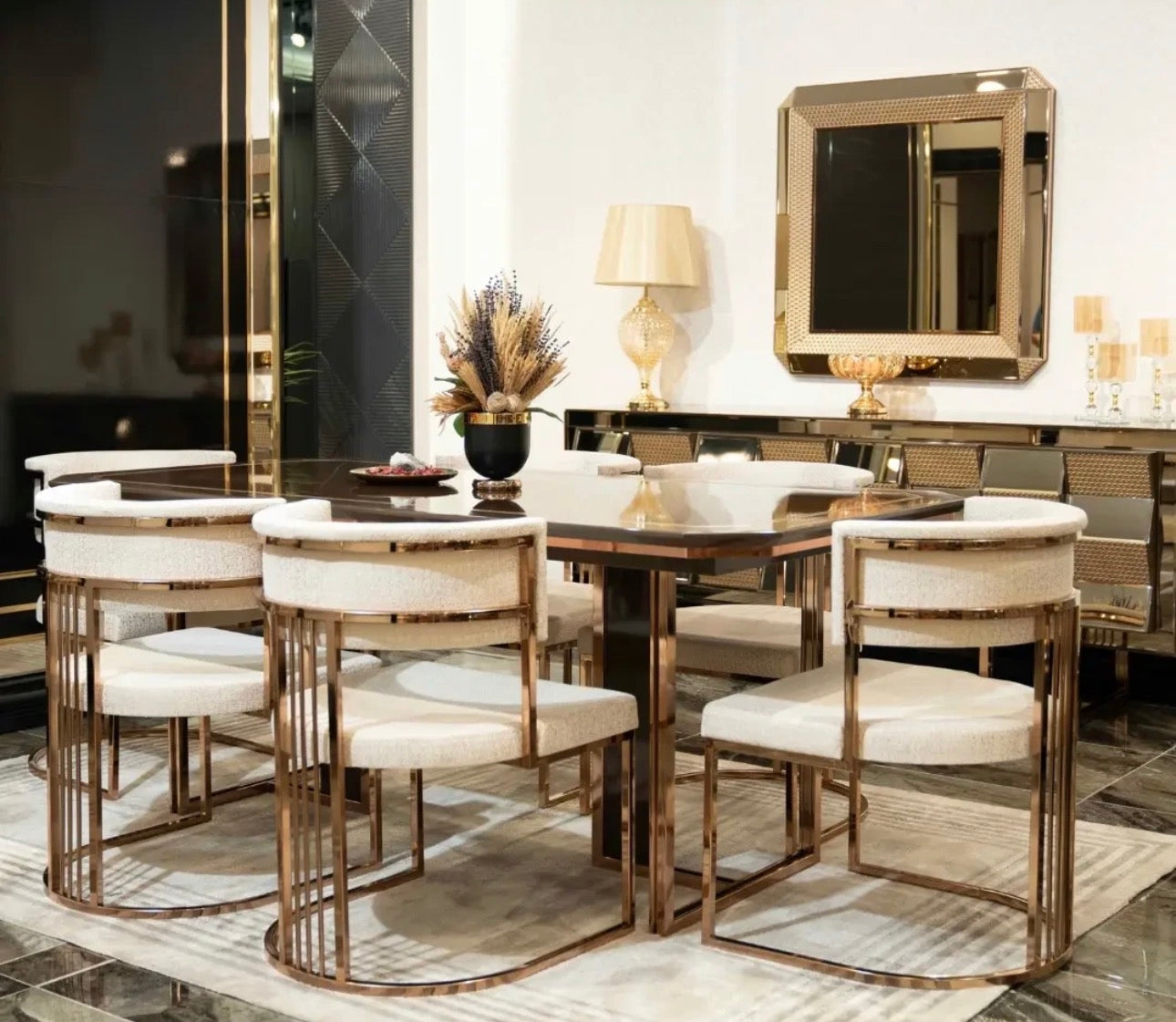 Nocturne luxury furniture collection featuring mirrored sofa detailing, geometric dining table, sculptural chairs, and modern glam interior design.