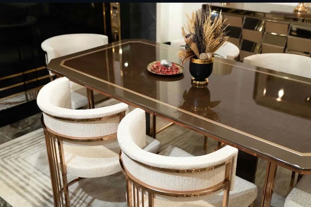 Nocturne luxury furniture collection featuring mirrored sofa detailing, geometric dining table, sculptural chairs, and modern glam interior design.
