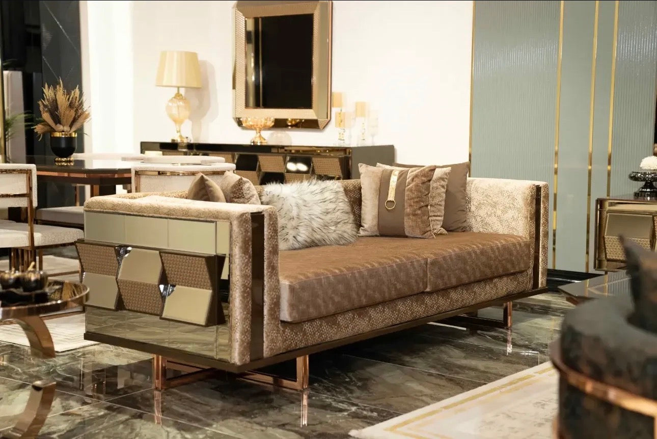 Nocturne luxury furniture collection featuring mirrored sofa detailing, geometric dining table, sculptural chairs, and modern glam interior design.
