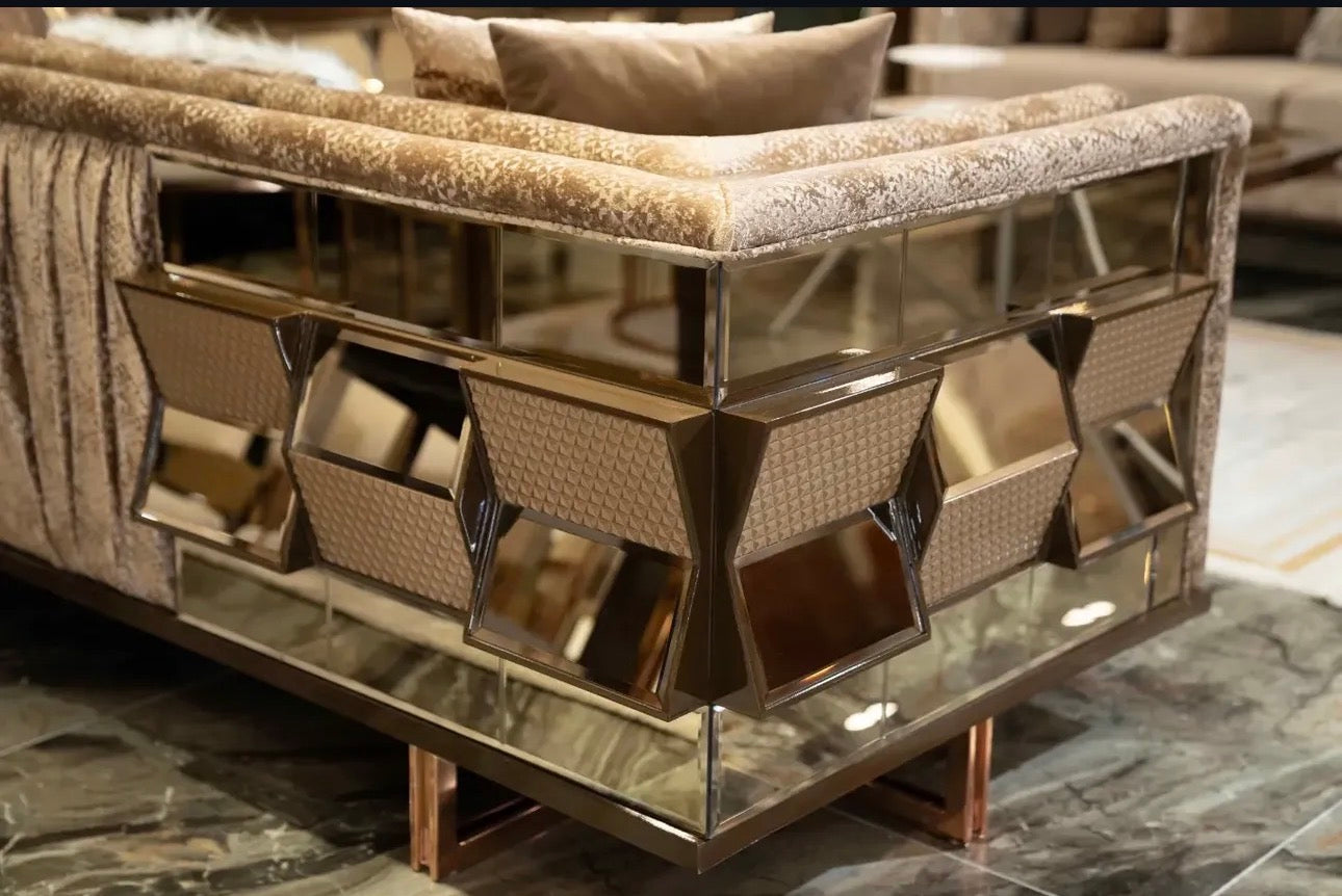 Nocturne luxury furniture collection featuring mirrored sofa detailing, geometric dining table, sculptural chairs, and modern glam interior design.