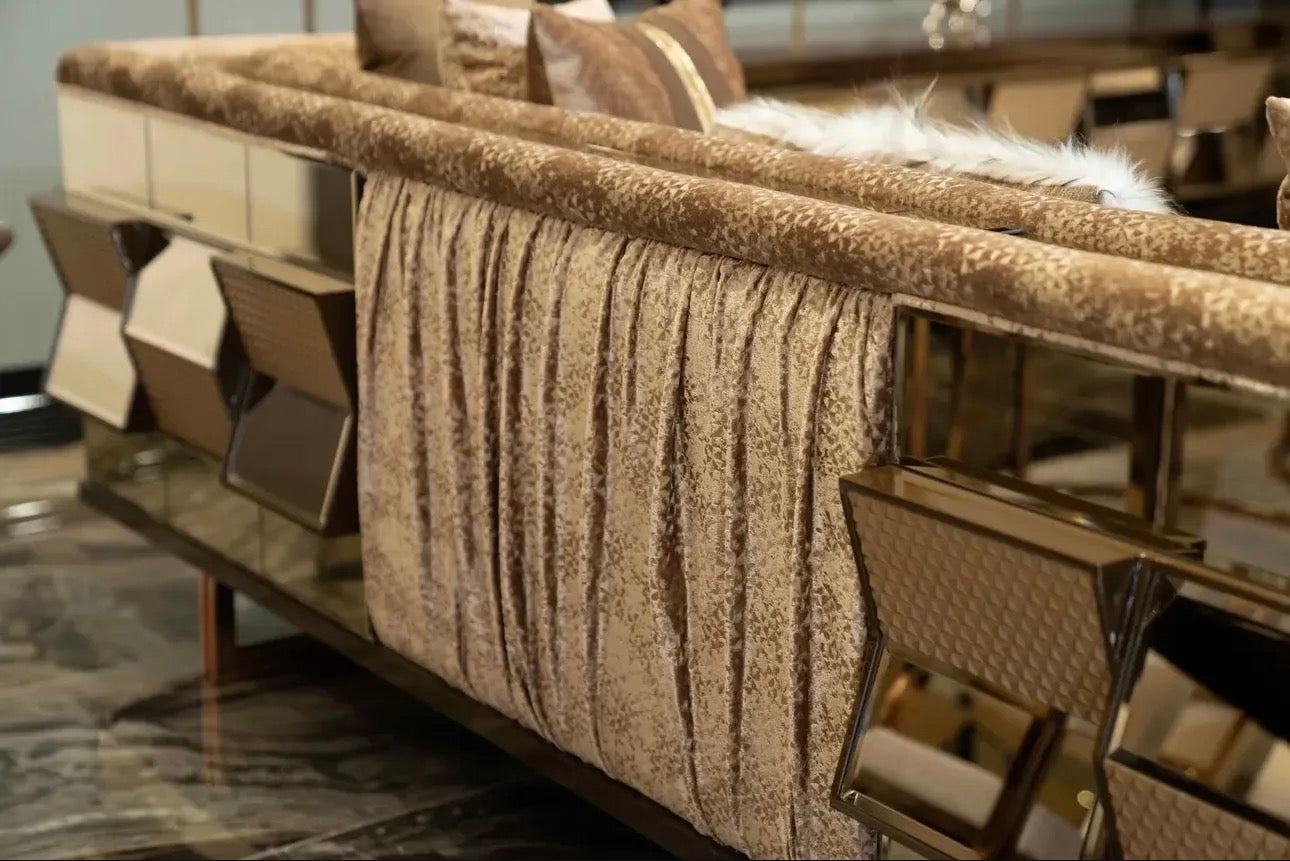 Nocturne luxury furniture collection featuring mirrored sofa detailing, geometric dining table, sculptural chairs, and modern glam interior design.