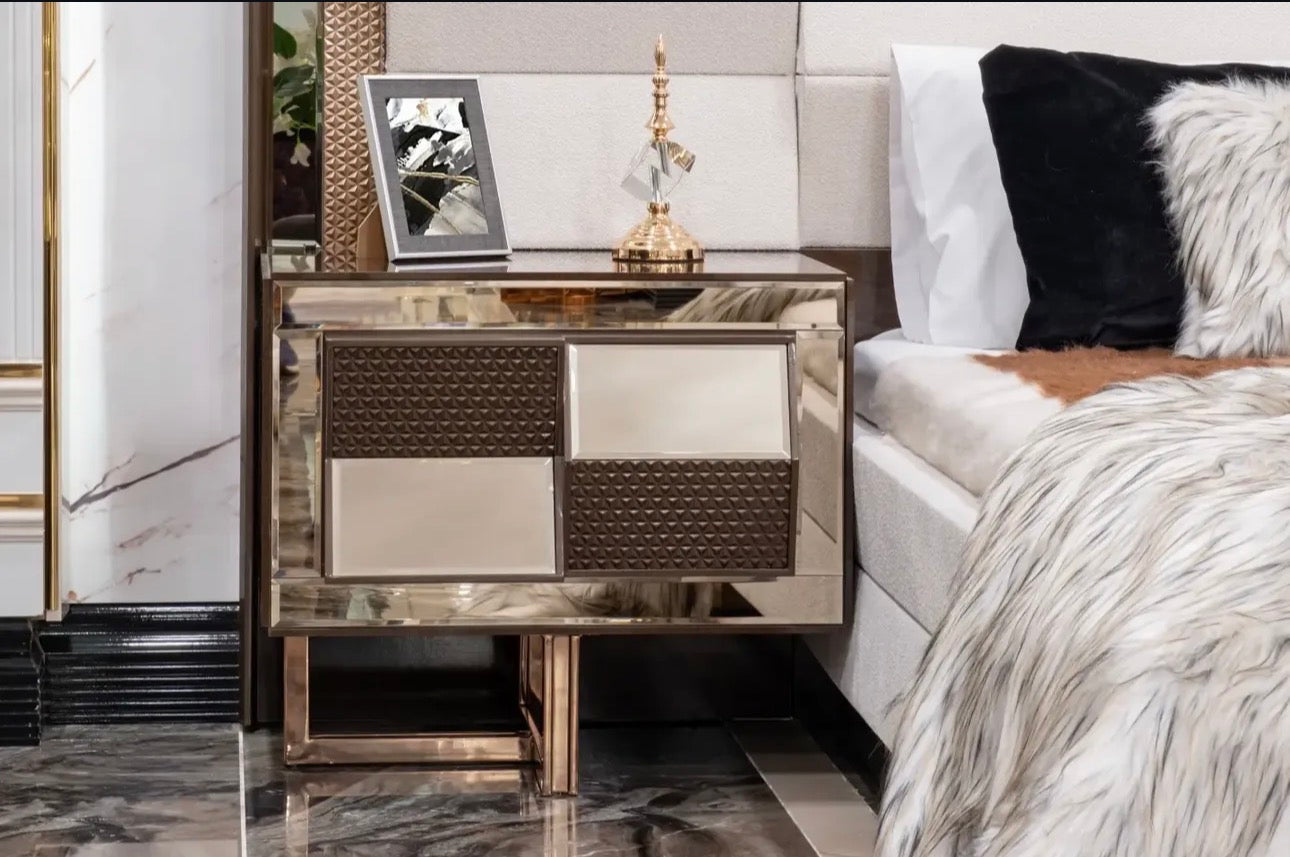 Nocturne luxury furniture collection featuring mirrored sofa detailing, geometric dining table, sculptural chairs, and modern glam interior design.