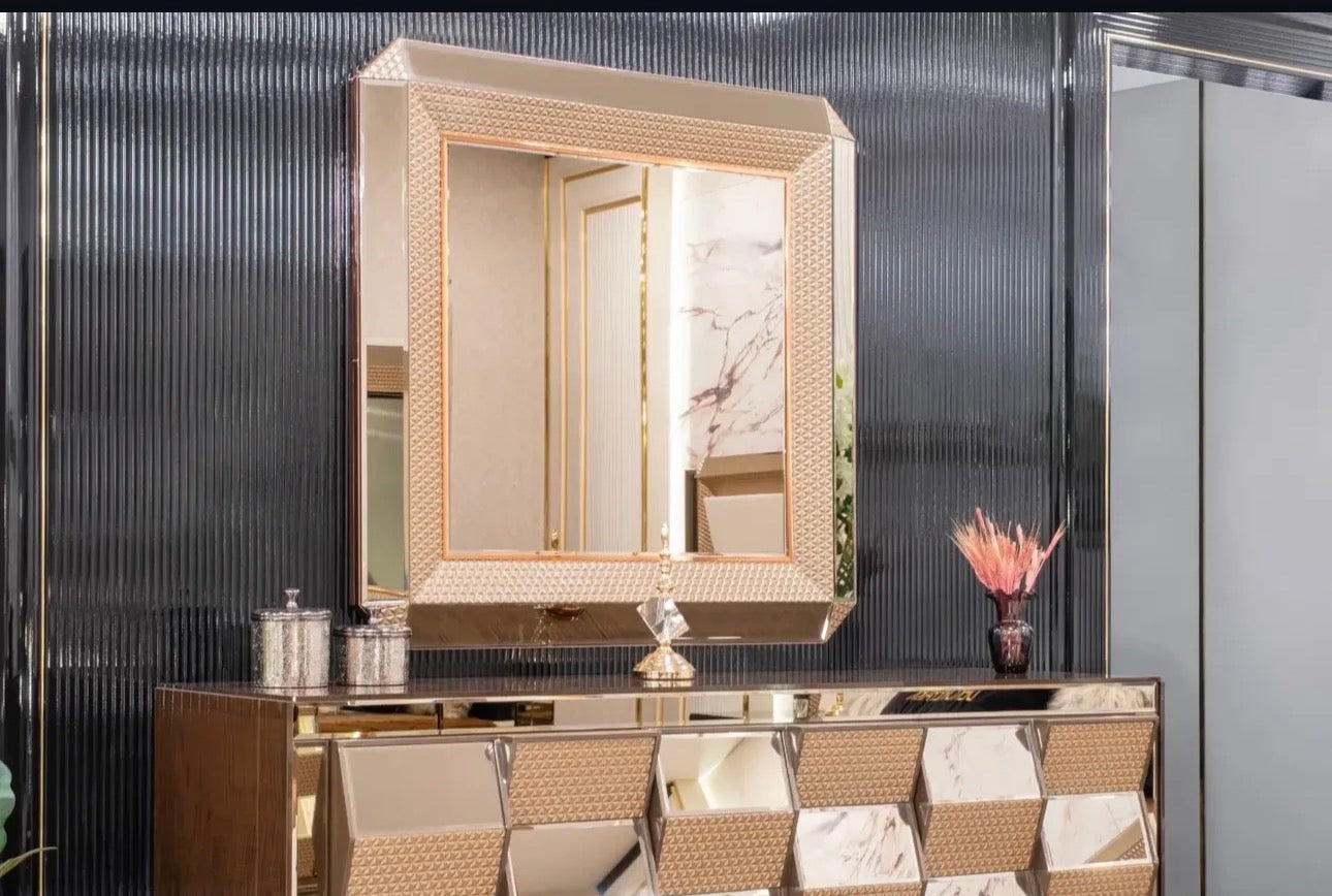 Nocturne luxury furniture collection featuring mirrored sofa detailing, geometric dining table, sculptural chairs, and modern glam interior design.