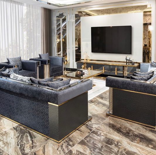 Ember luxury furniture collection with sculptural living room seating, dramatic bedroom set and gold accent dining furniture