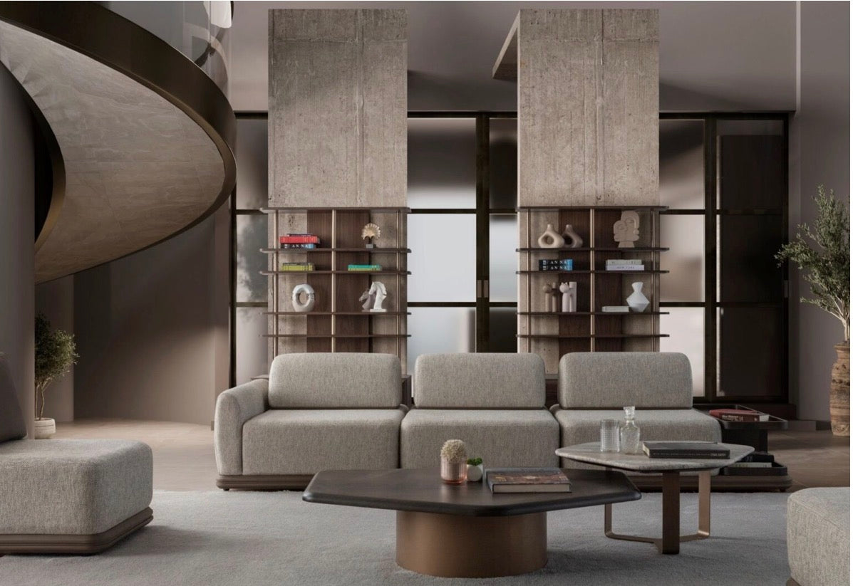 Afterglow modular sectional sofa collection with sculptural coffee tables and modern neutral lounge seating in a contemporary luxury interior.