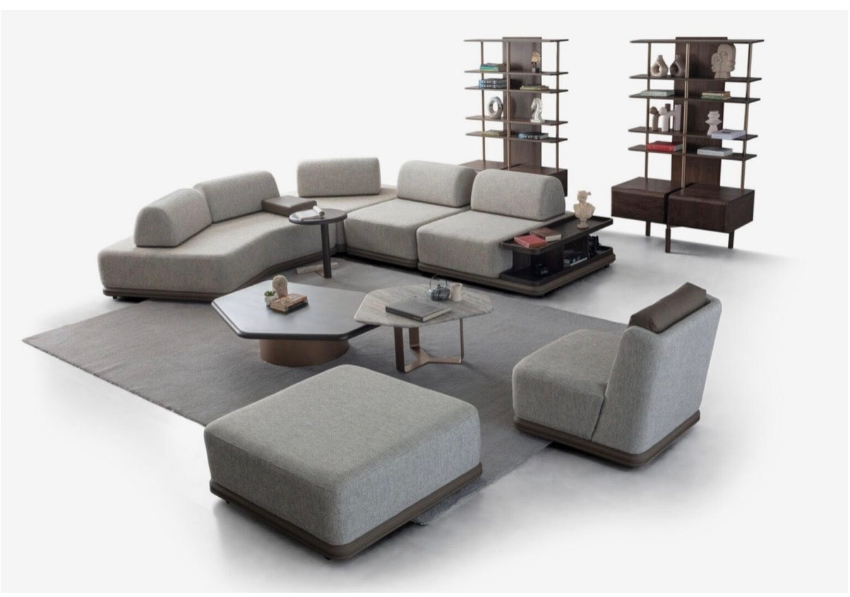 Afterglow modular sectional sofa collection with sculptural coffee tables and modern neutral lounge seating in a contemporary luxury interior.