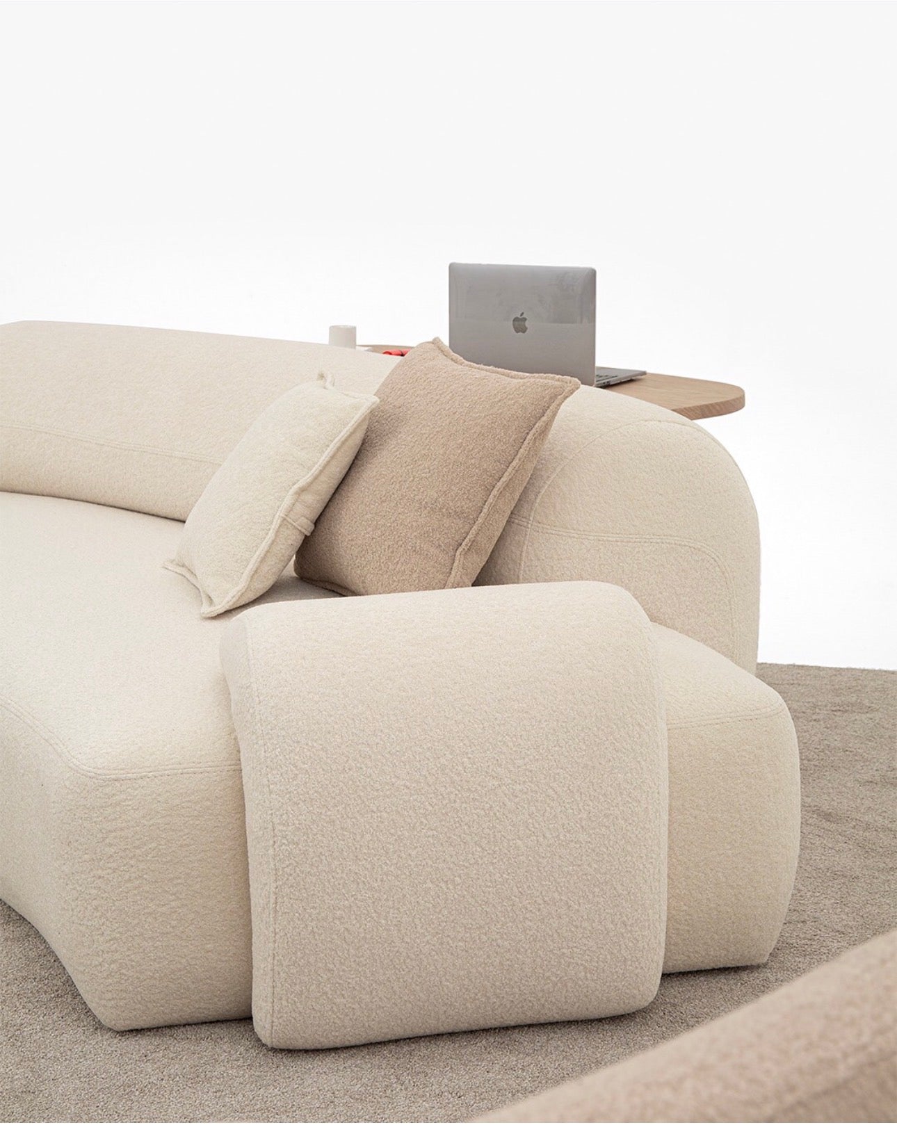 Aureum luxury furniture collection featuring modern neutral living room seating, sculptural dining set, and illuminated contemporary bedroom design.