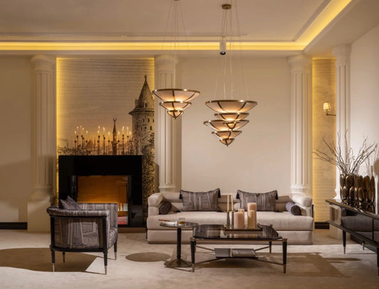 Velvetroom luxury furniture collection featuring elegant sofa seating, modern dining table, illuminated cabinetry, and sculptural pendant lighting.