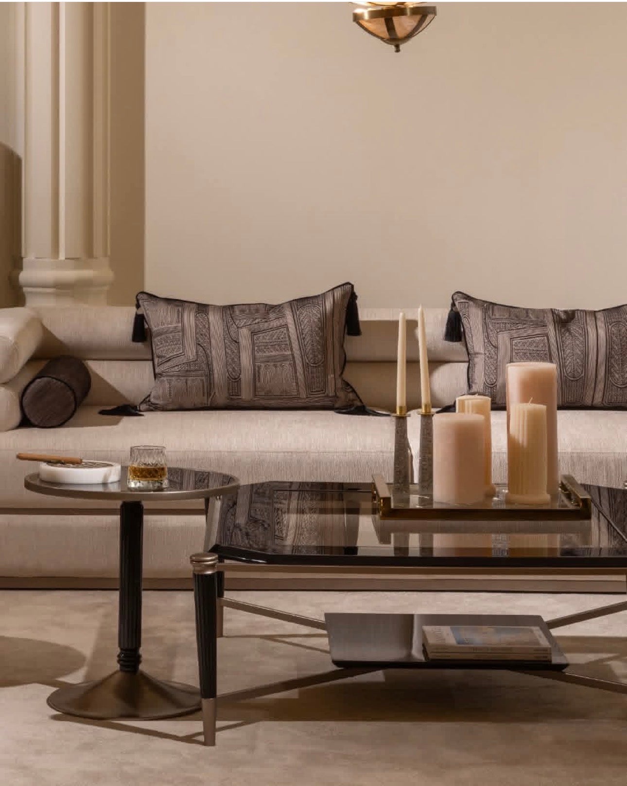 Velvetroom luxury furniture collection featuring elegant sofa seating, modern dining table, illuminated cabinetry, and sculptural pendant lighting.