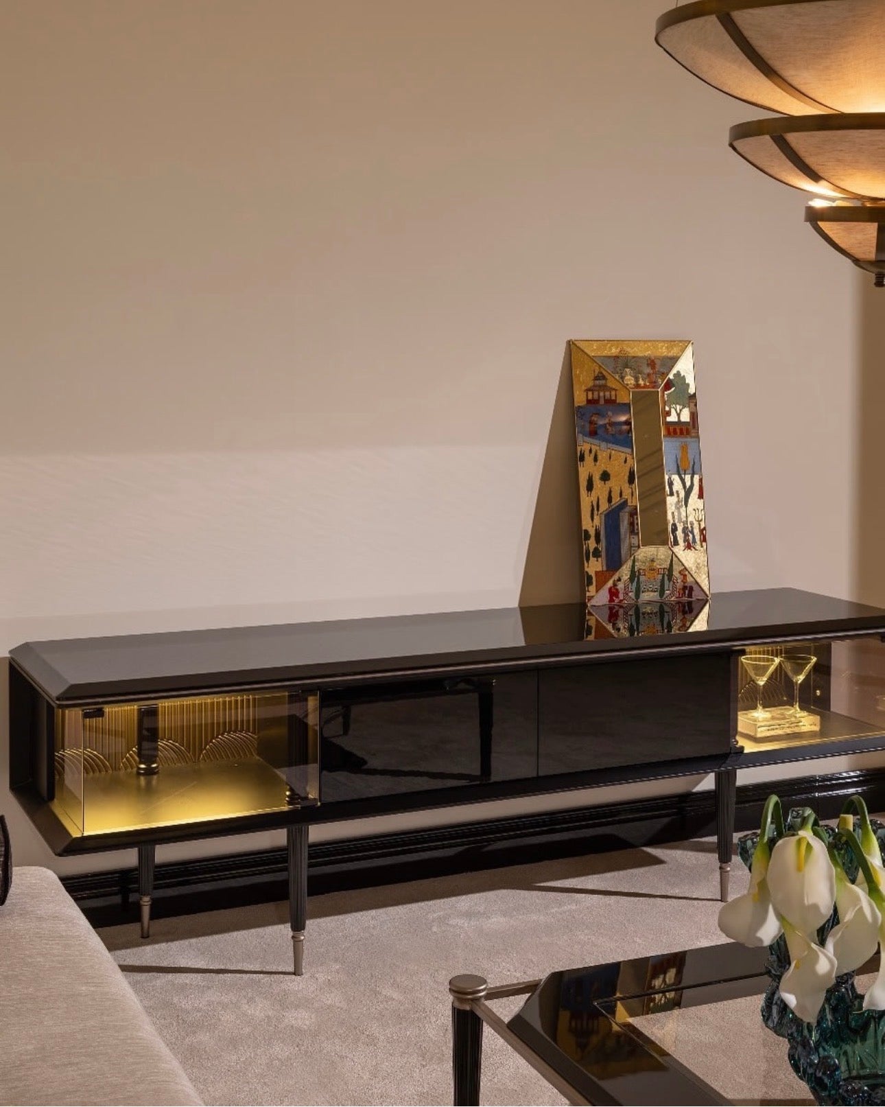 Velvetroom luxury furniture collection featuring elegant sofa seating, modern dining table, illuminated cabinetry, and sculptural pendant lighting.