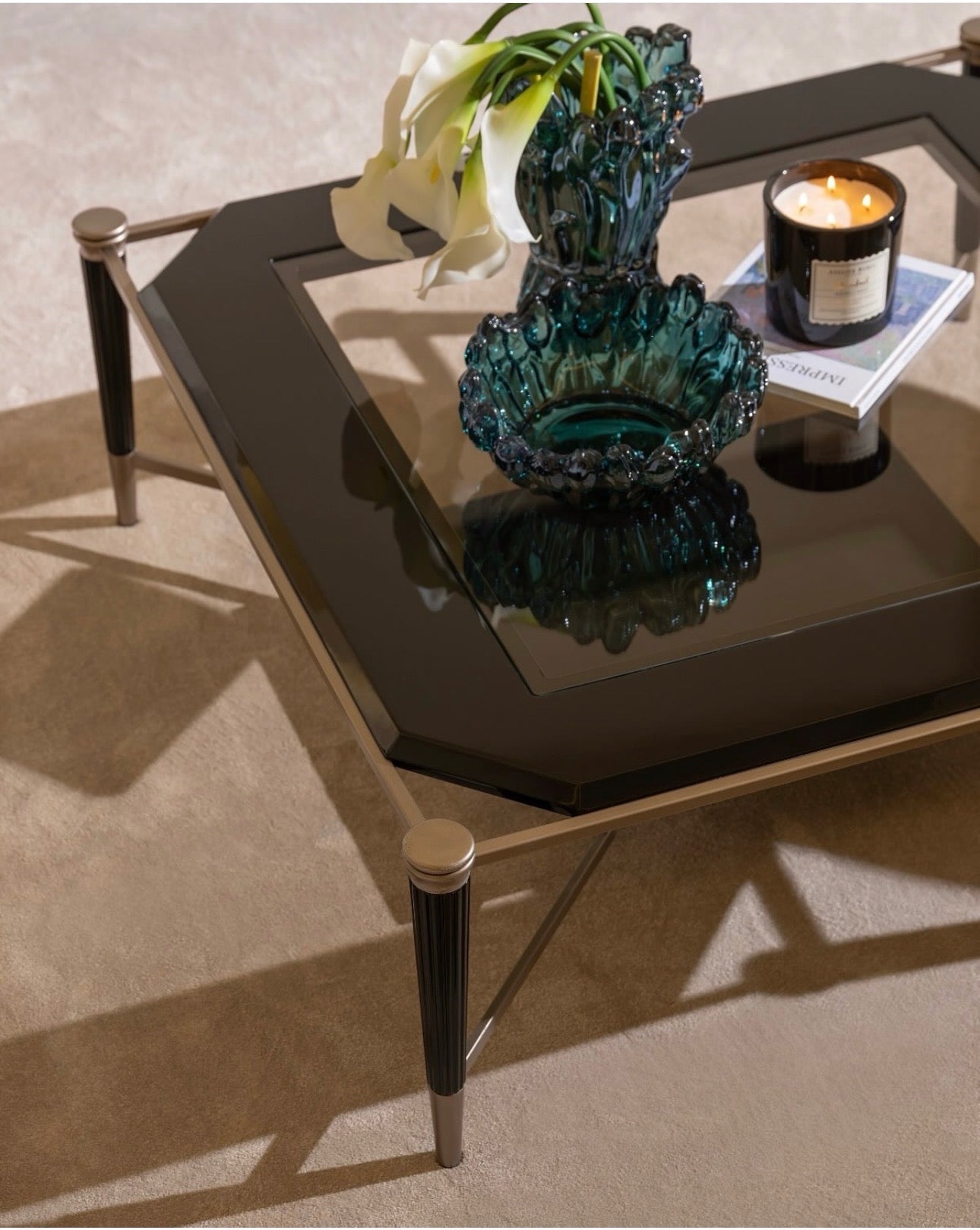 Velvetroom luxury furniture collection featuring elegant sofa seating, modern dining table, illuminated cabinetry, and sculptural pendant lighting.