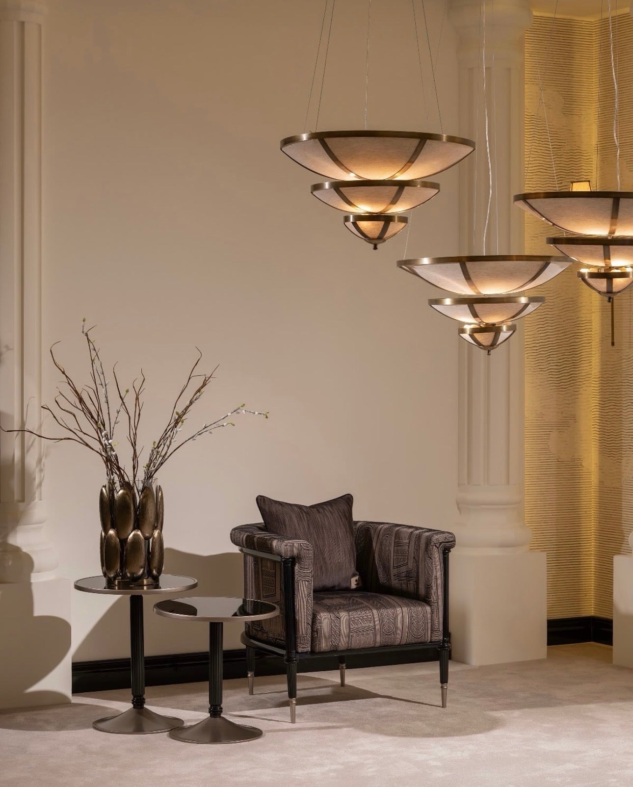 Velvetroom luxury furniture collection featuring elegant sofa seating, modern dining table, illuminated cabinetry, and sculptural pendant lighting.