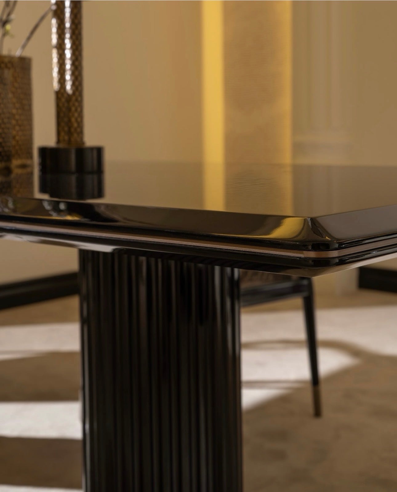 Velvetroom luxury furniture collection featuring elegant sofa seating, modern dining table, illuminated cabinetry, and sculptural pendant lighting.