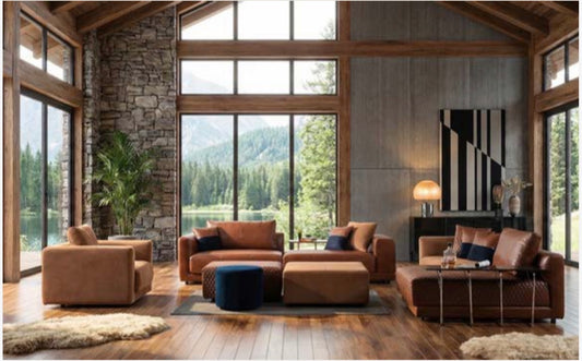 Prelude luxury furniture collection featuring modern sofa seating, elegant dining table with upholstered chairs, and contemporary neutral interior design.