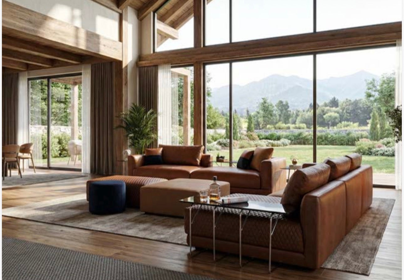 Prelude luxury furniture collection featuring modern sofa seating, elegant dining table with upholstered chairs, and contemporary neutral interior design.