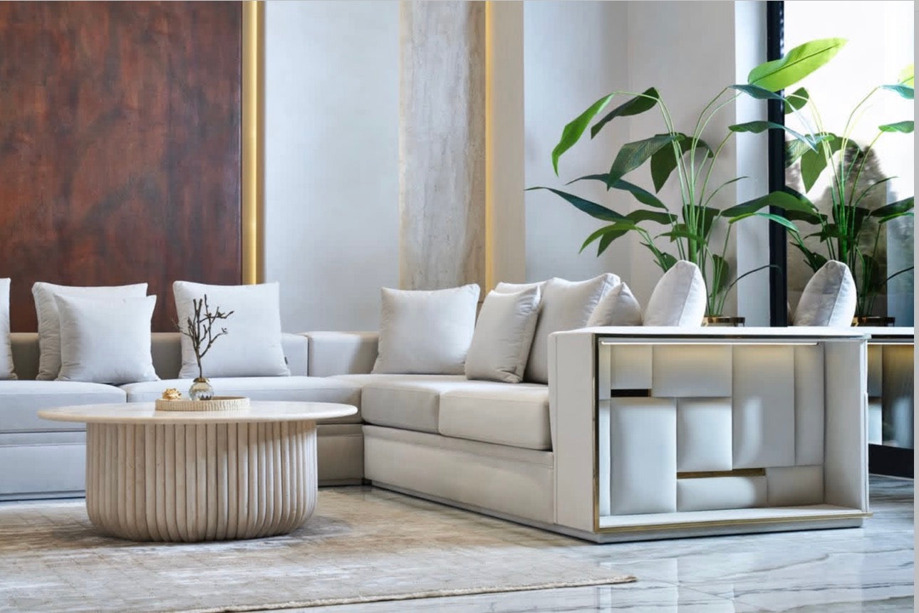 Rhythm luxury furniture collection featuring modular sofa, black dining table, gold detailed sideboard, and geometric modern design.