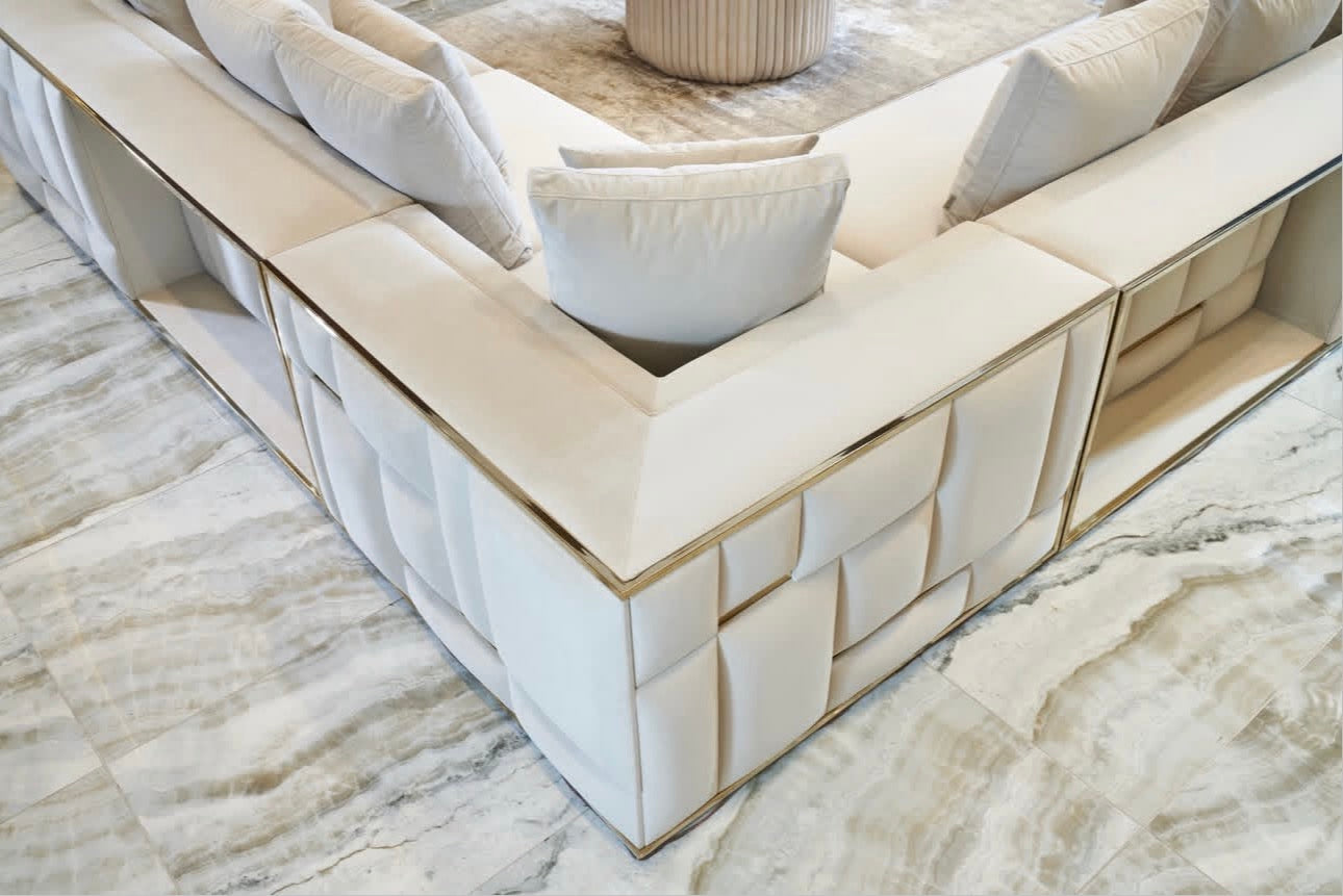 Rhythm luxury furniture collection featuring modular sofa, black dining table, gold detailed sideboard, and geometric modern design.