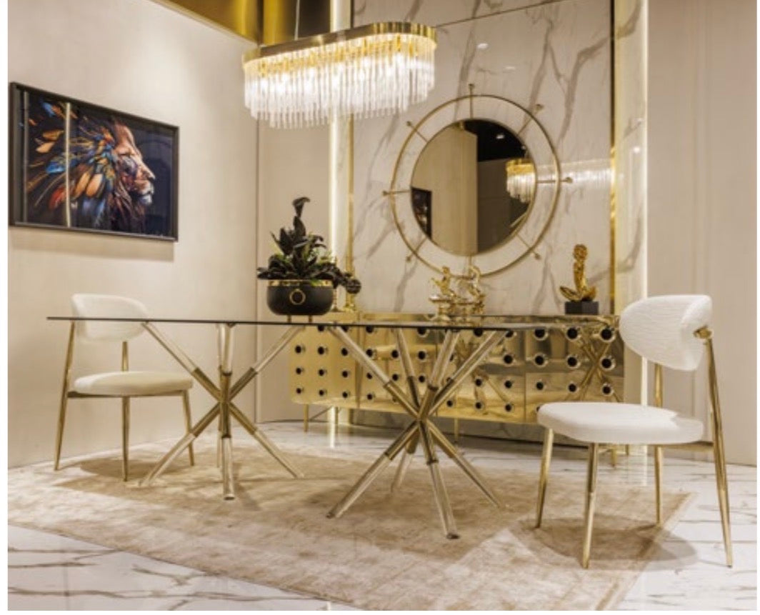 Ivory luxury furniture collection with gold sideboard, marble walls, white seating, and modern high-end living and dining design.