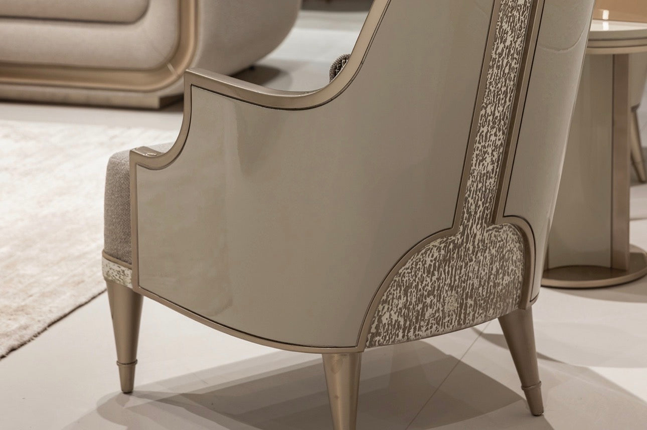 Prelude luxury furniture collection featuring modern sofa seating, elegant dining table with upholstered chairs, and contemporary neutral interior design.