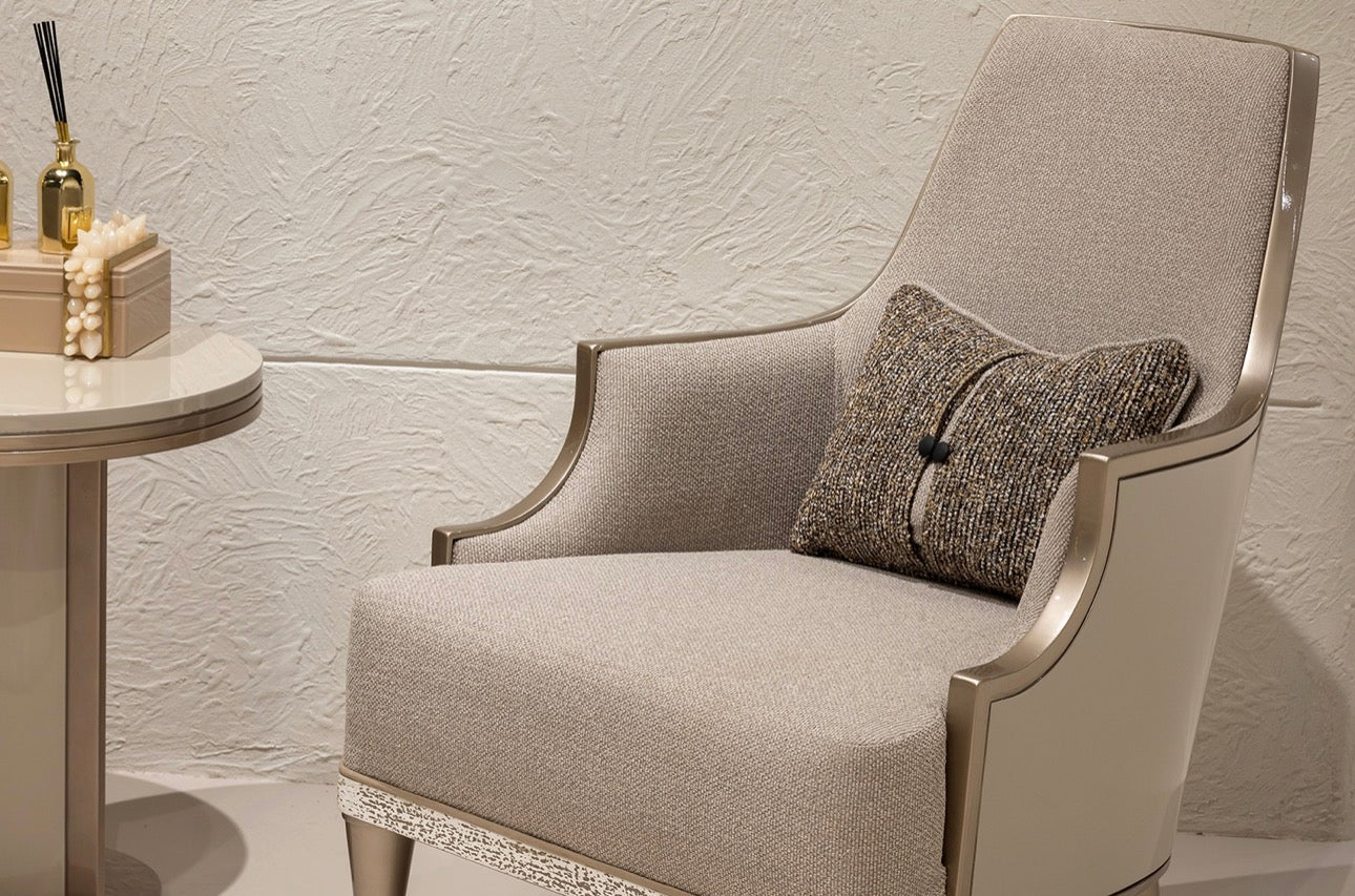 Prelude luxury furniture collection featuring modern sofa seating, elegant dining table with upholstered chairs, and contemporary neutral interior design.