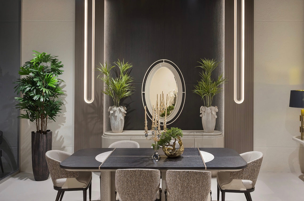 Prelude luxury furniture collection featuring modern sofa seating, elegant dining table with upholstered chairs, and contemporary neutral interior design.