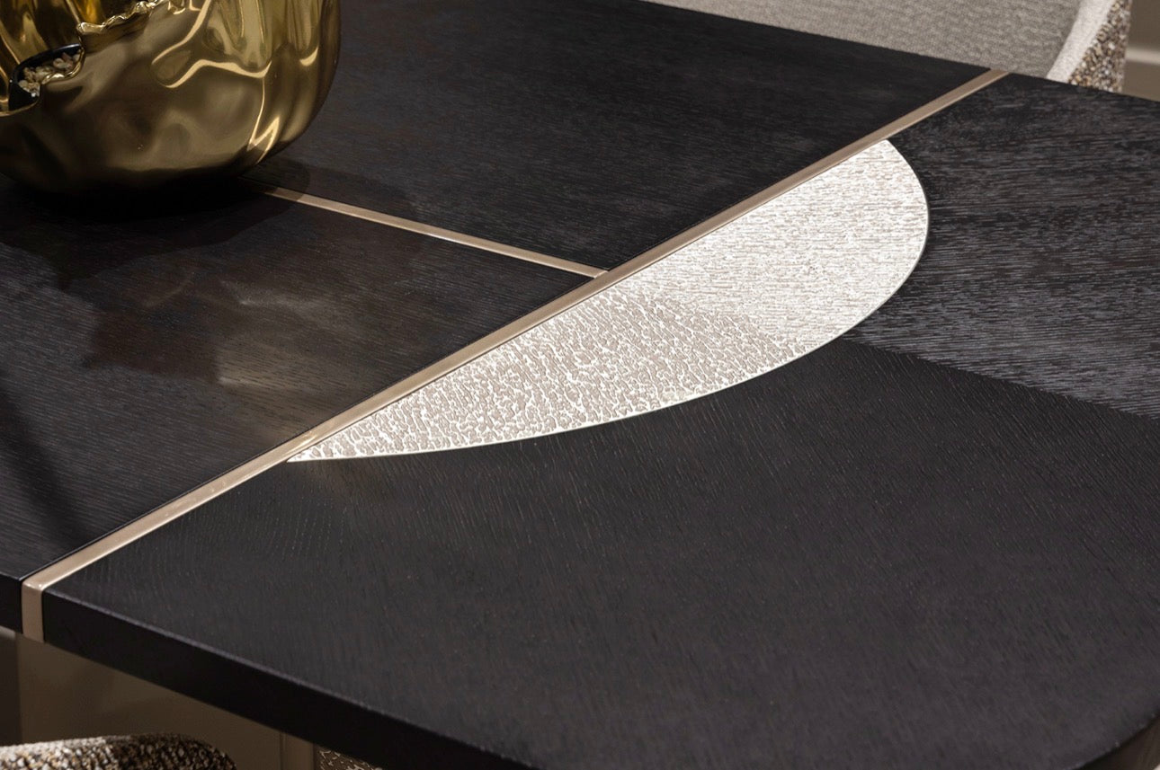 Prelude luxury furniture collection featuring modern sofa seating, elegant dining table with upholstered chairs, and contemporary neutral interior design.