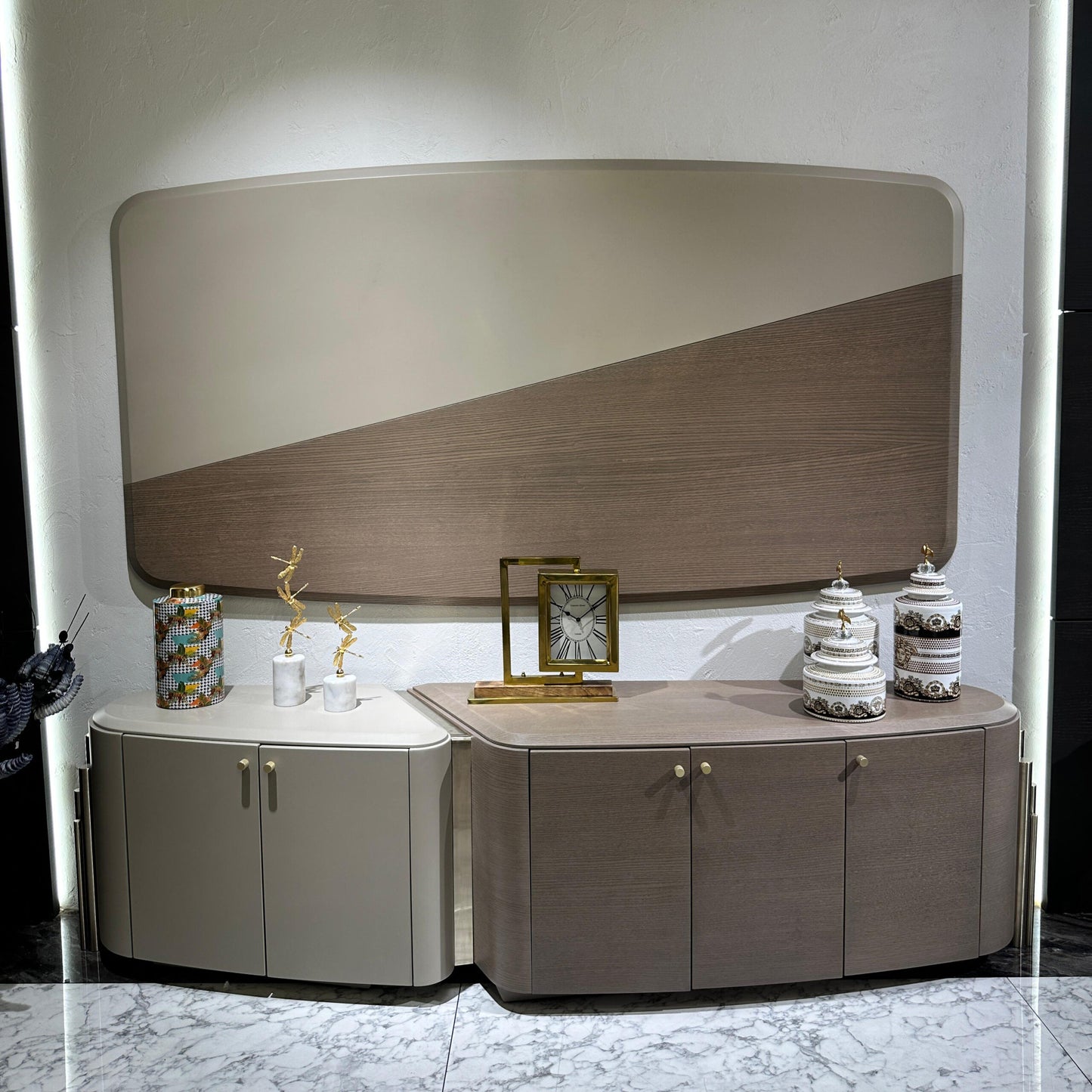 Sonata luxury furniture collection featuring curved modern sofas, sculptural accent chairs, and contemporary dining table in warm neutral tones.