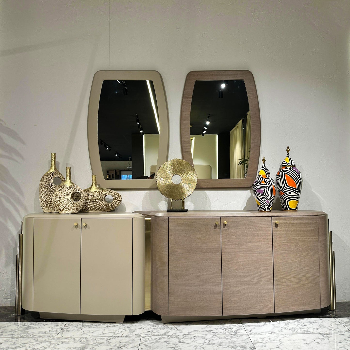 Sonata luxury furniture collection featuring curved modern sofas, sculptural accent chairs, and contemporary dining table in warm neutral tones.