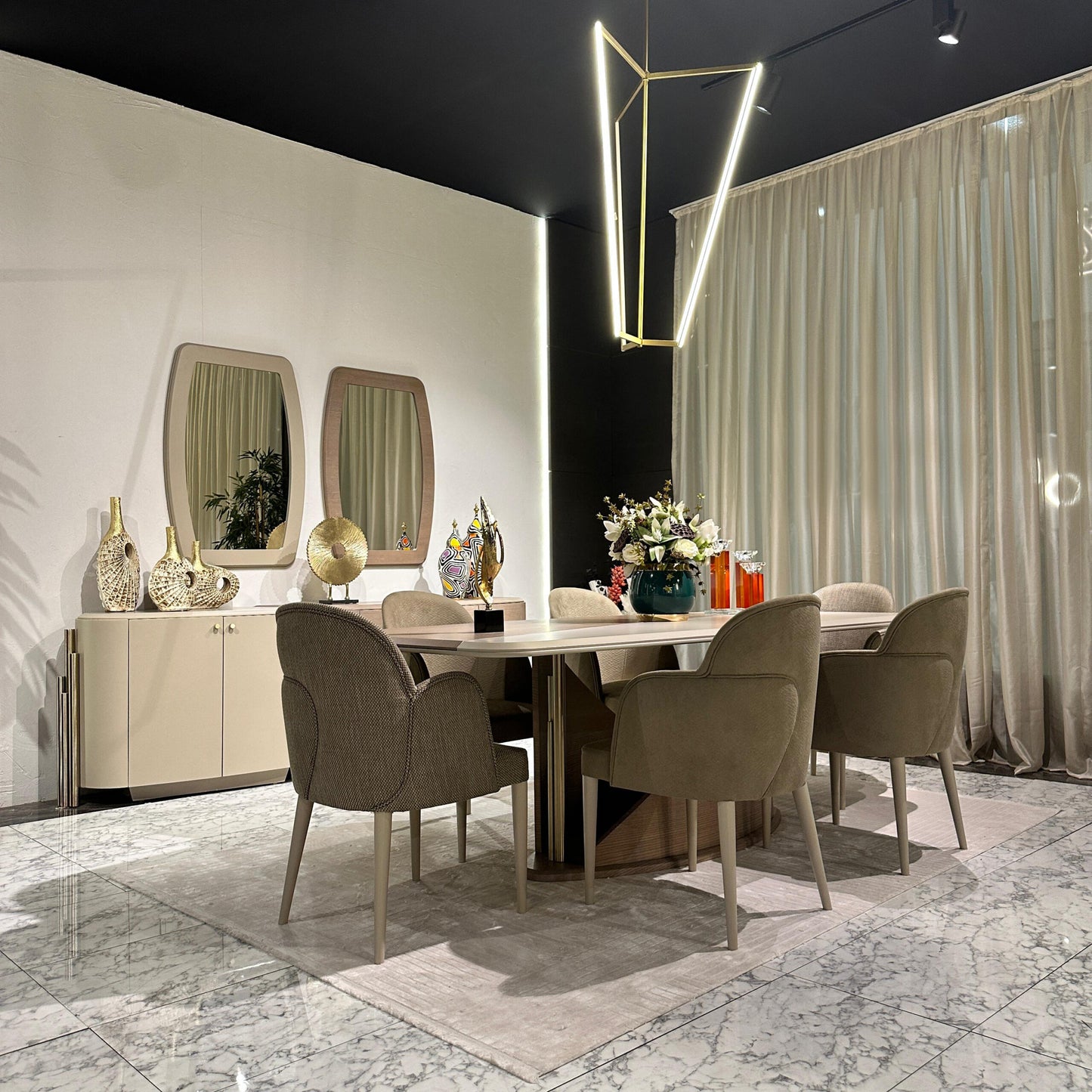 Sonata luxury furniture collection featuring curved modern sofas, sculptural accent chairs, and contemporary dining table in warm neutral tones.