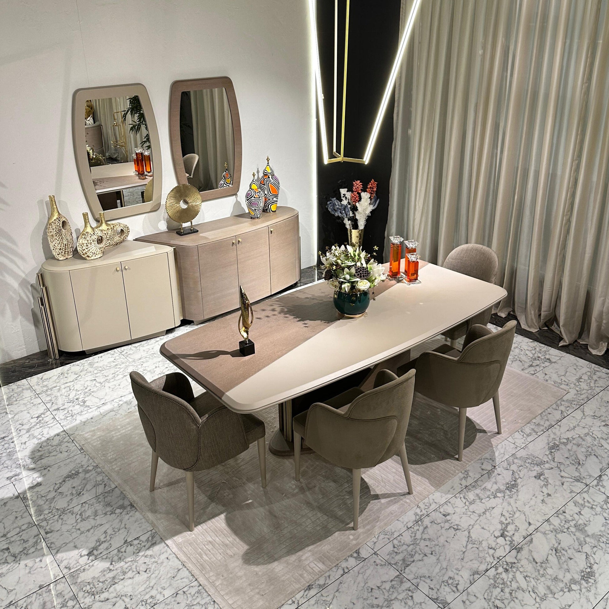 Sonata luxury furniture collection featuring curved modern sofas, sculptural accent chairs, and contemporary dining table in warm neutral tones.