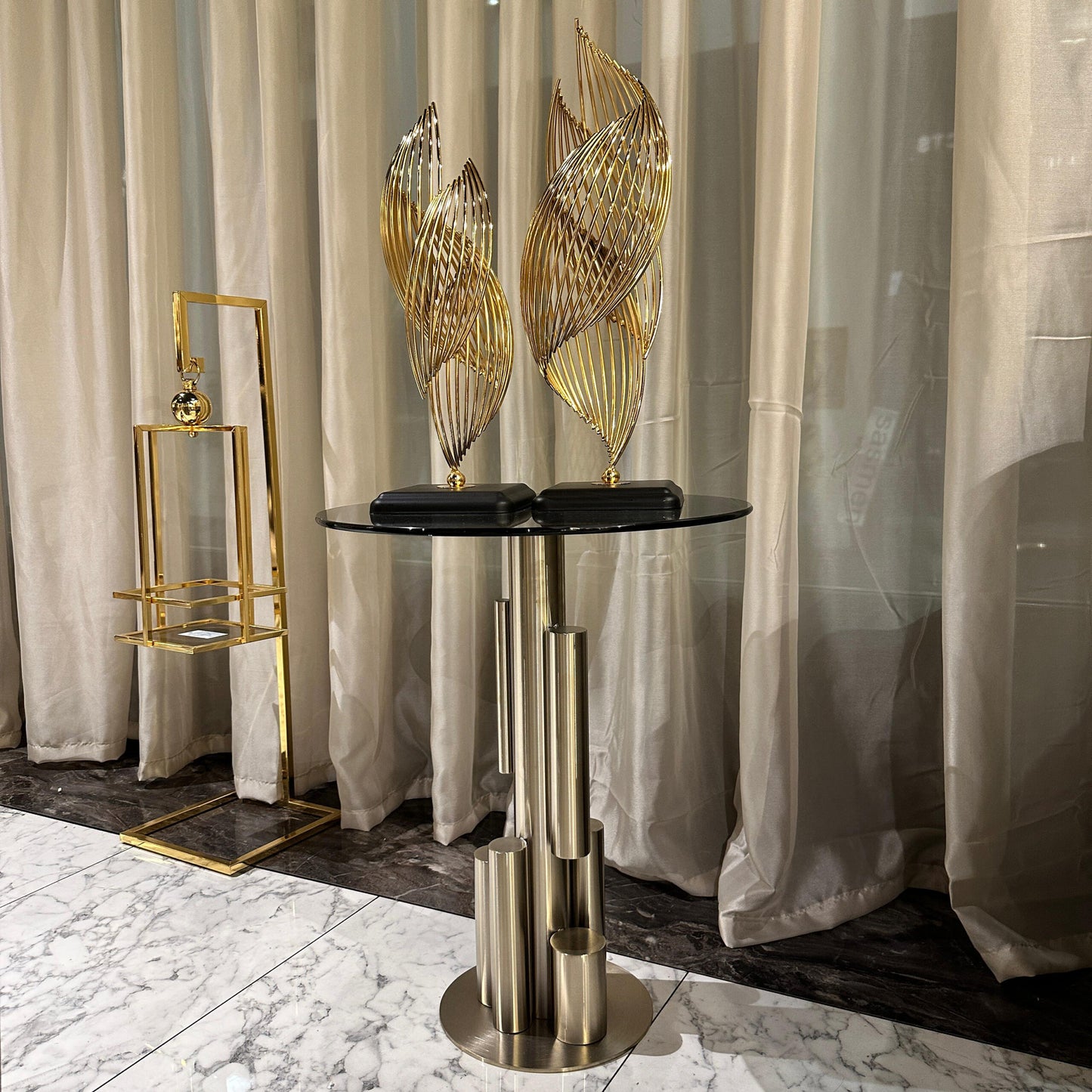 Sonata luxury furniture collection featuring curved modern sofas, sculptural accent chairs, and contemporary dining table in warm neutral tones.