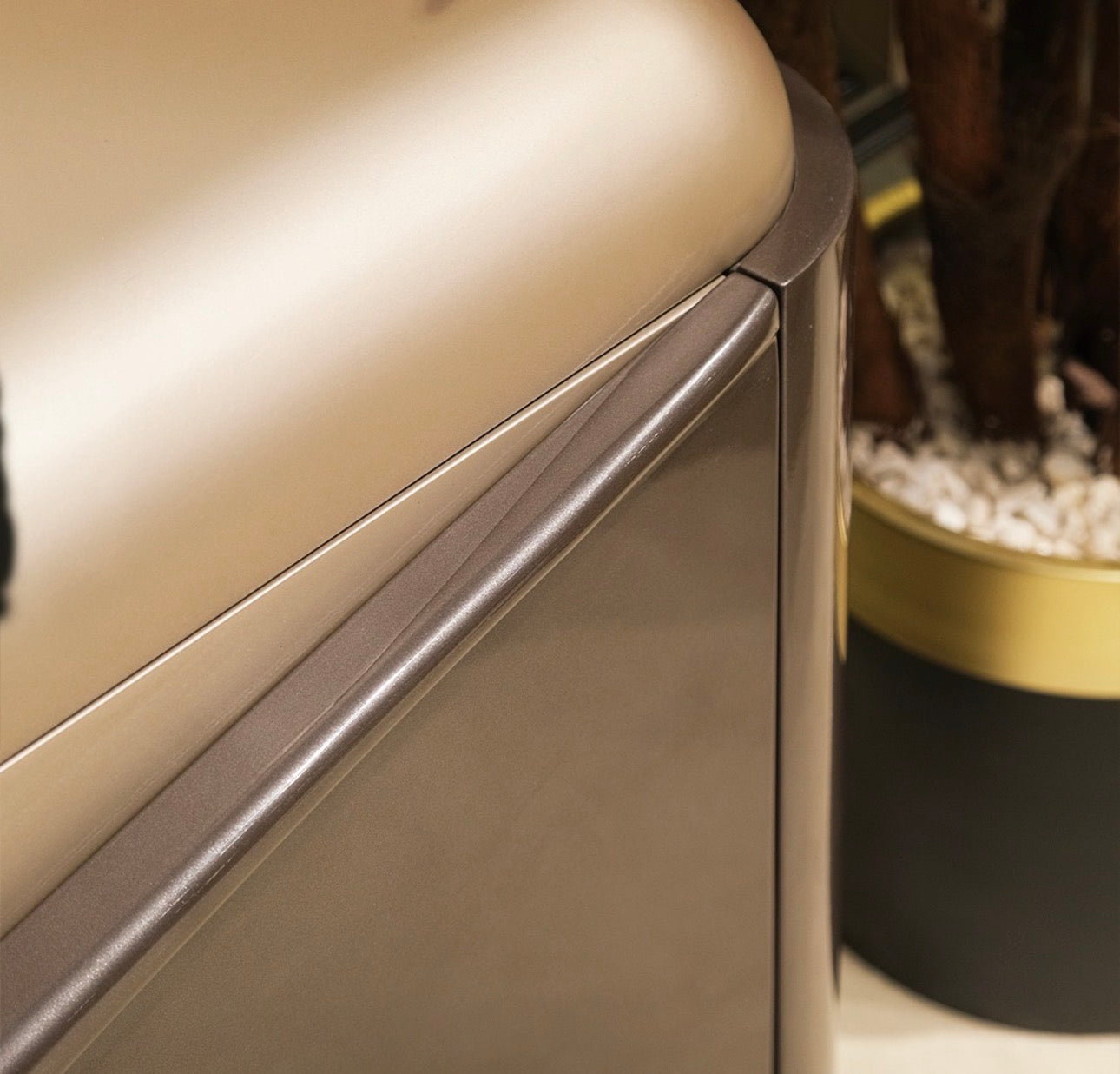 Regal luxury furniture collection featuring curved sofa seating, modern dining table with upholstered chairs, and contemporary living room design.