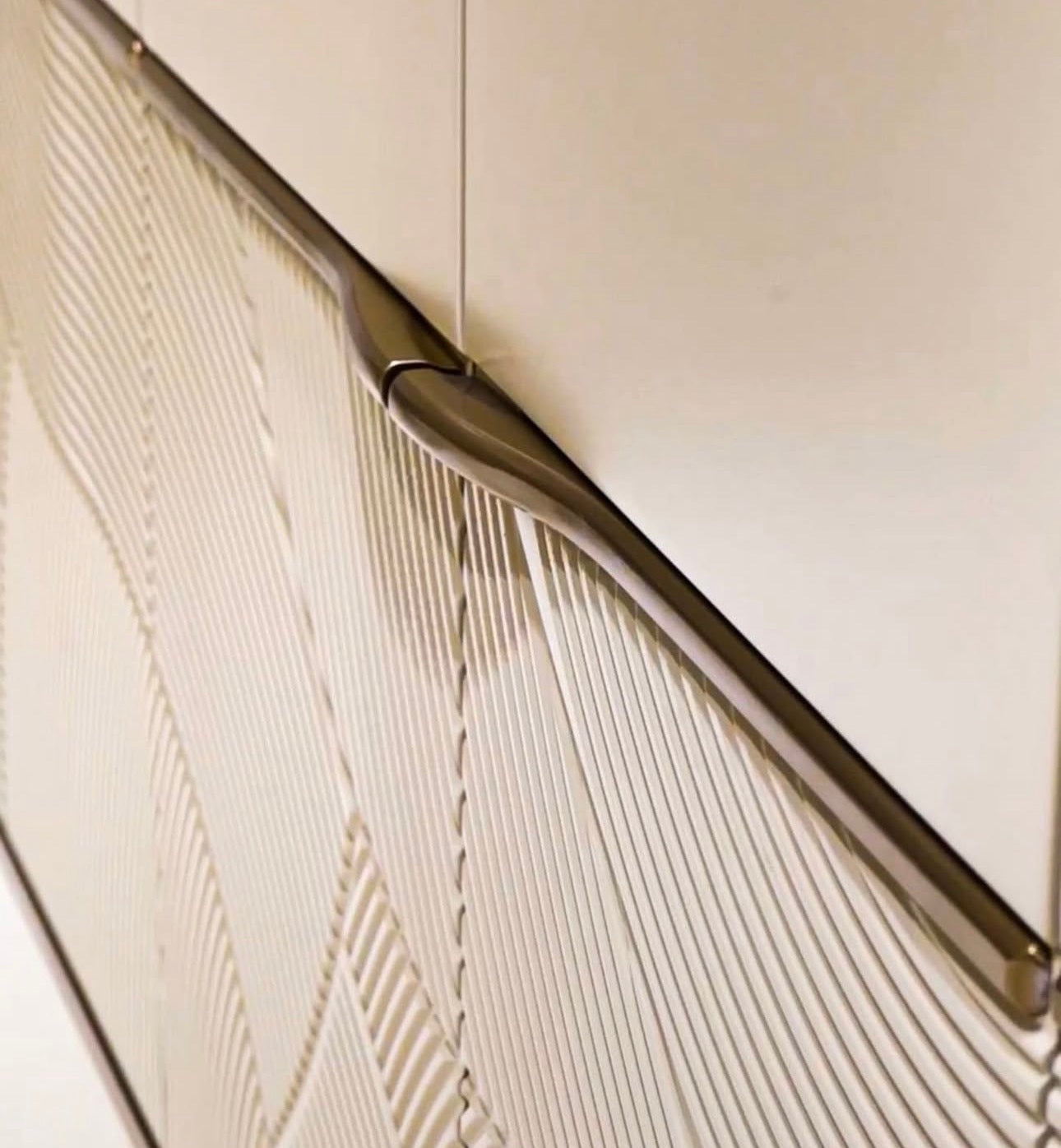 Cinder luxury bedroom collection featuring upholstered bed, modern vanity, neutral nightstands, and contemporary wardrobe system.