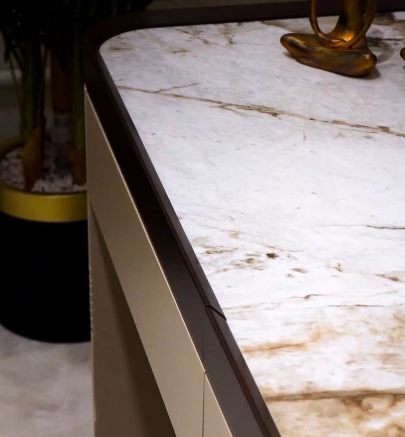 Cinder luxury bedroom collection featuring upholstered bed, modern vanity, neutral nightstands, and contemporary wardrobe system.