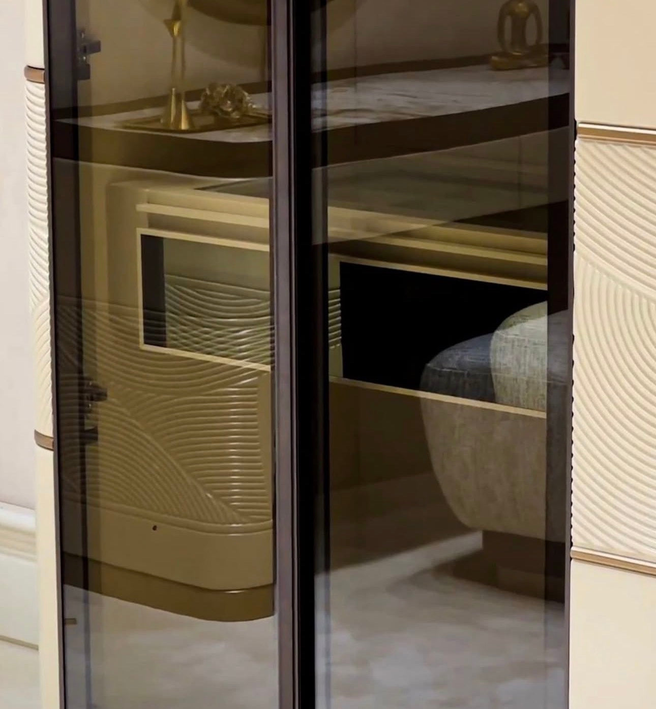 Cinder luxury bedroom collection featuring upholstered bed, modern vanity, neutral nightstands, and contemporary wardrobe system.