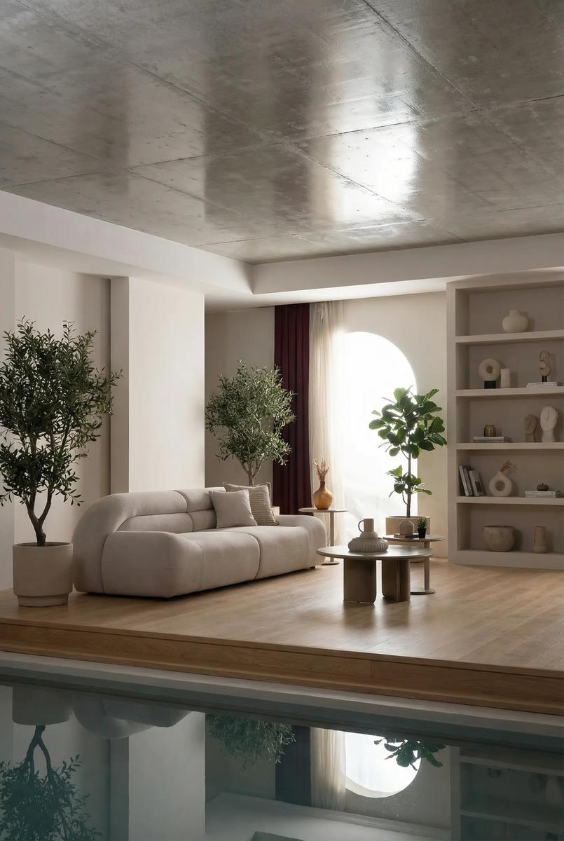 Valour modern luxury living room furniture collection featuring sculptural curved sofas, neutral upholstery, and minimalist contemporary design.