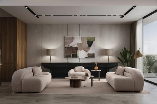 Valour modern luxury living room furniture collection featuring sculptural curved sofas, neutral upholstery, and minimalist contemporary design.