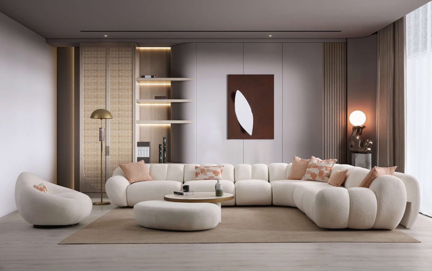 Lunar sculptural living room collection featuring curved modular sofa, rounded lounge chair, and modern minimalist interior design.