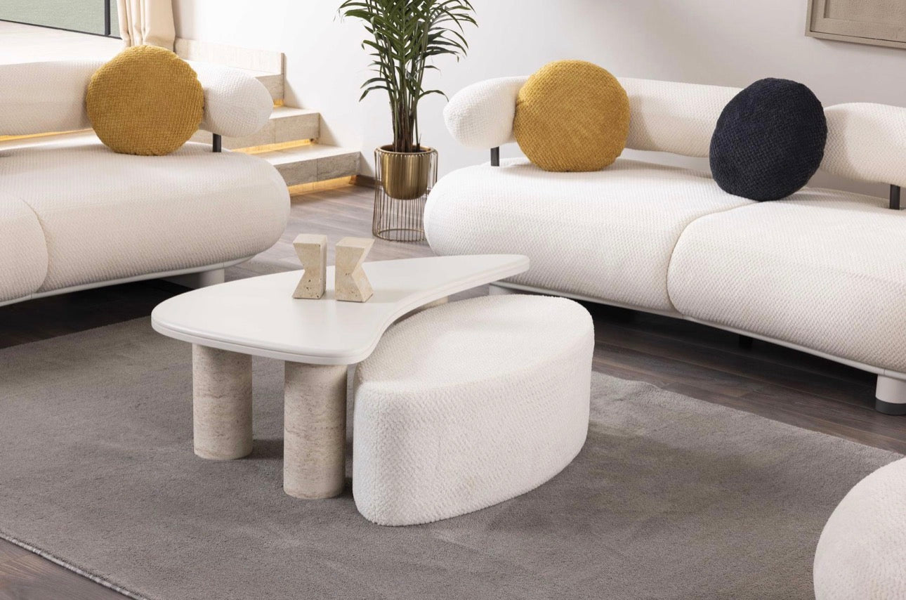 Amberhall modern curved furniture collection featuring sculptural sofa seating, ivory textures, and contemporary minimalist interior design.