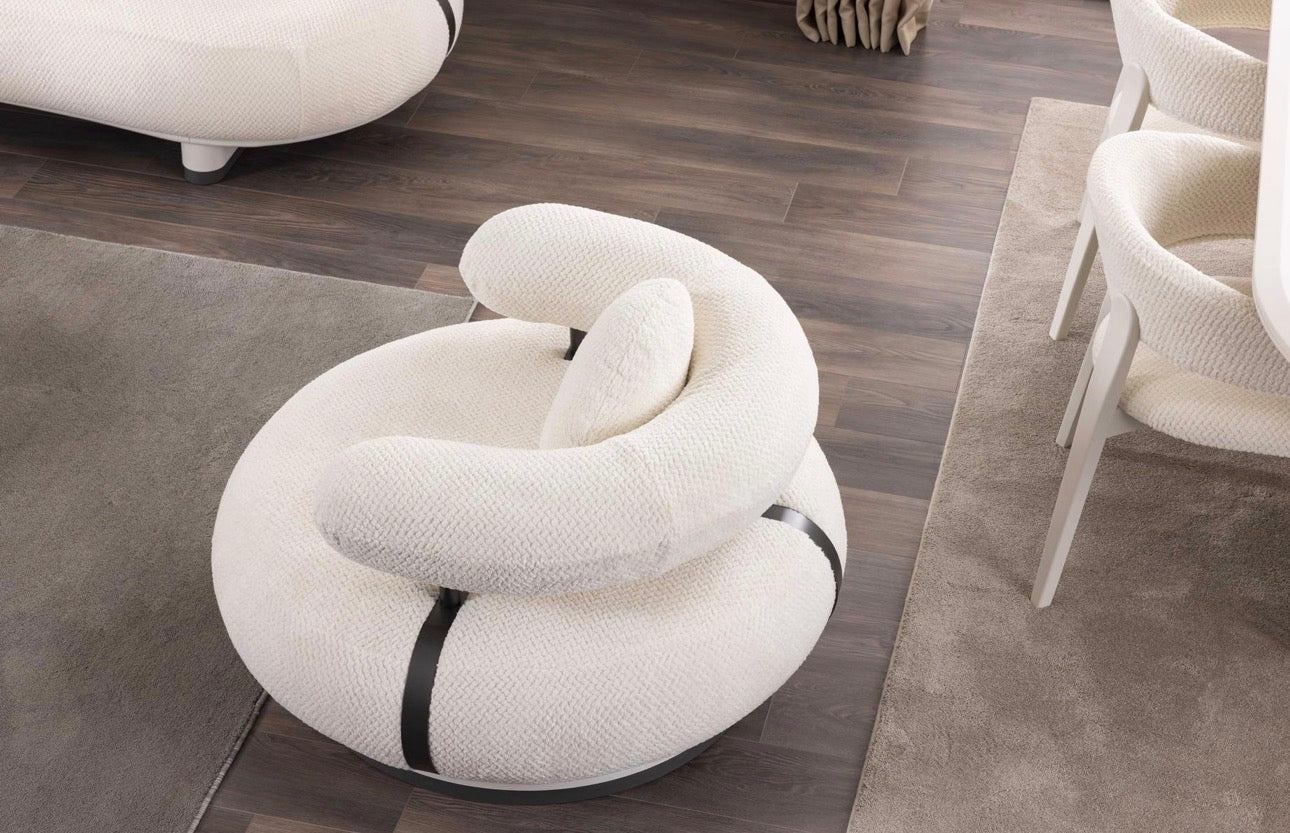 Amberhall modern curved furniture collection featuring sculptural sofa seating, ivory textures, and contemporary minimalist interior design.