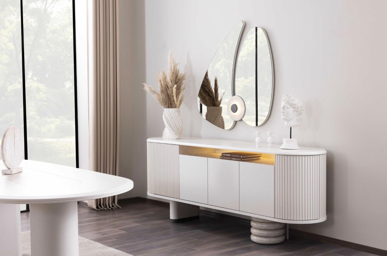 Amberhall modern curved furniture collection featuring sculptural sofa seating, ivory textures, and contemporary minimalist interior design.