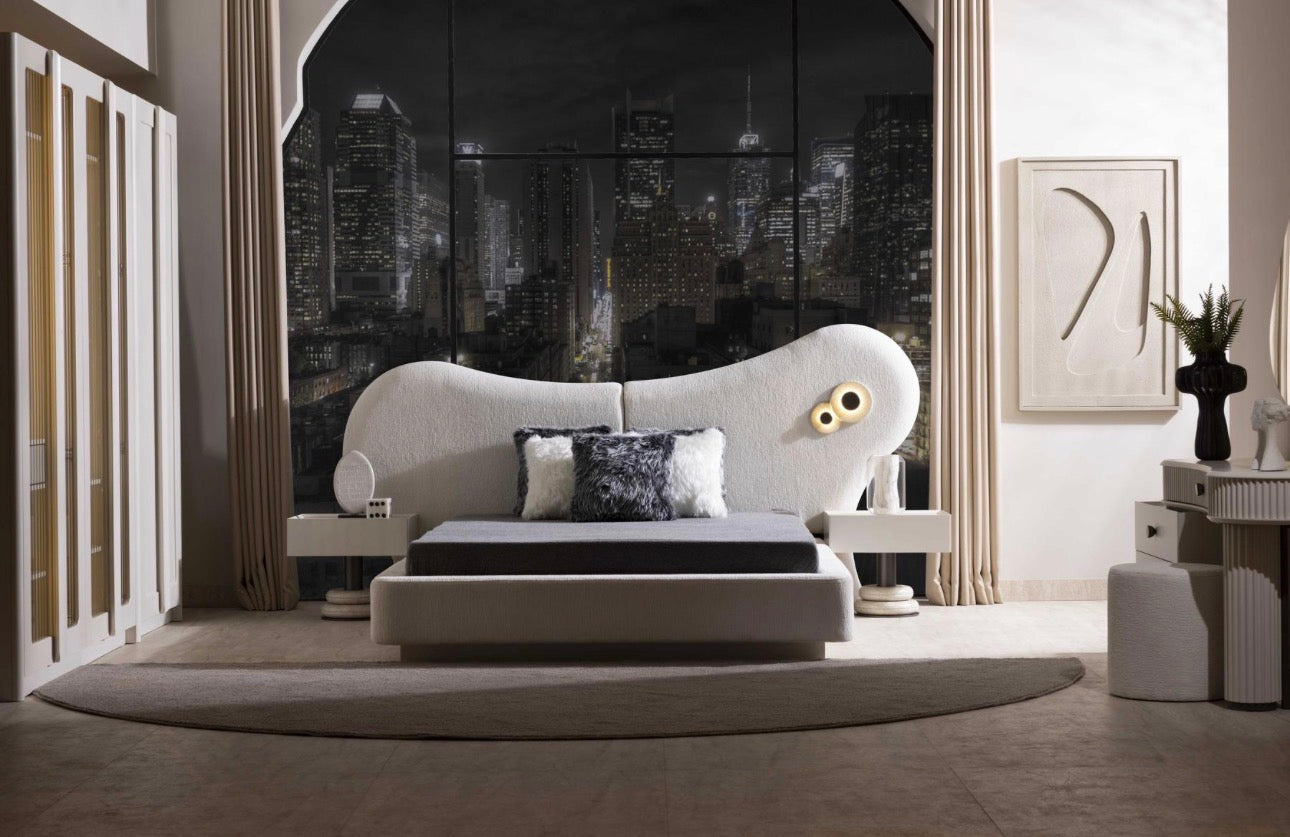 Amberhall modern curved furniture collection featuring sculptural sofa seating, ivory textures, and contemporary minimalist interior design.