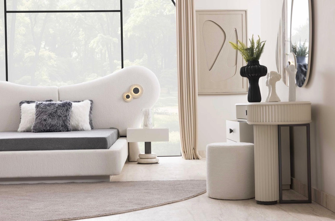 Amberhall modern curved furniture collection featuring sculptural sofa seating, ivory textures, and contemporary minimalist interior design.