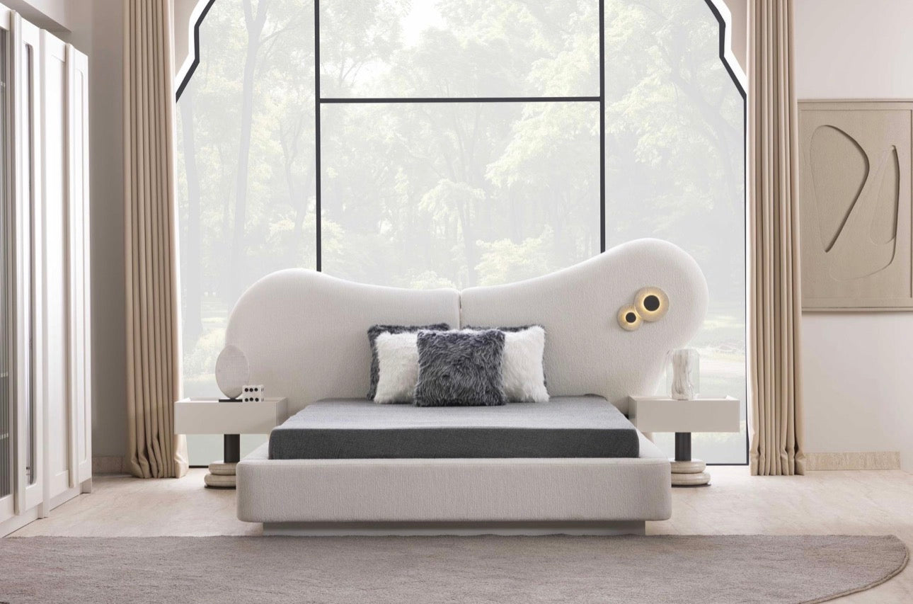 Amberhall modern curved furniture collection featuring sculptural sofa seating, ivory textures, and contemporary minimalist interior design.