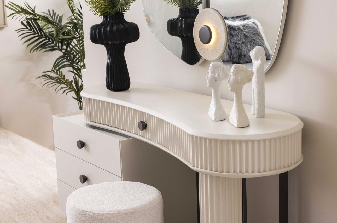 Amberhall modern curved furniture collection featuring sculptural sofa seating, ivory textures, and contemporary minimalist interior design.