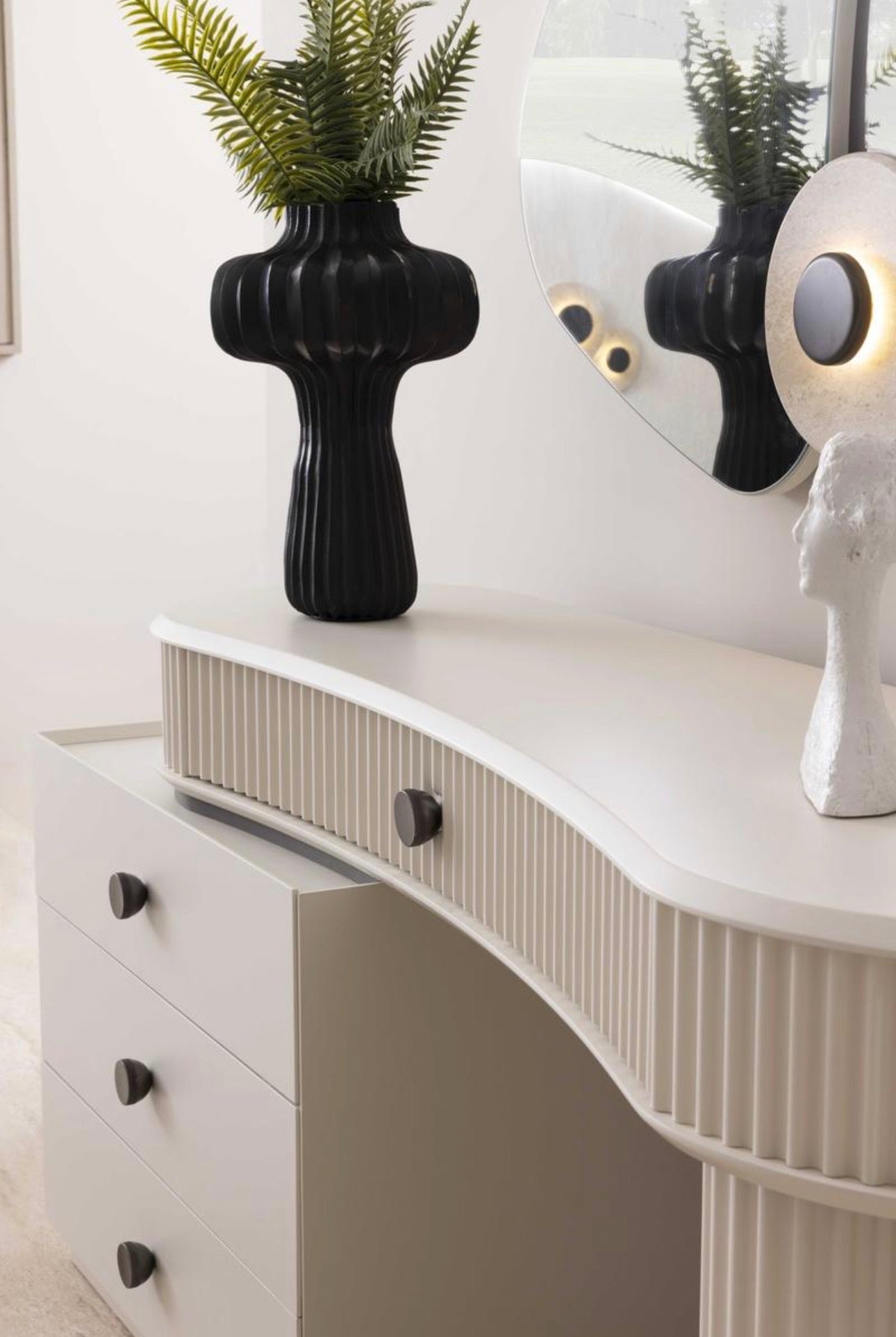 Amberhall modern curved furniture collection featuring sculptural sofa seating, ivory textures, and contemporary minimalist interior design.